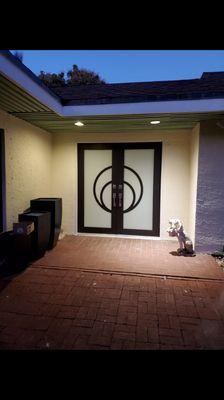 Bronze door with modern design installed