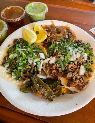 Just opened Taqueria inside.  Two Asada tacos