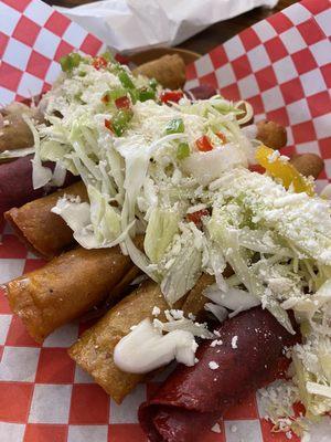 Homemade mixed chicken + potato and cheese taquitos with fresh made veggie tortilla's. Light crispy- seriously the best in town.