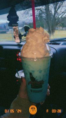 Cotton candy, blue raspberry, blue lotus with cream and whip