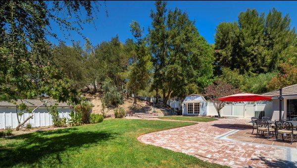 Lots of hard scape and brick work that goes up to the barn area, includes 2 wash room and tack room, auto water trough for horses.