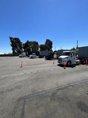 Trucks parked in the yard.