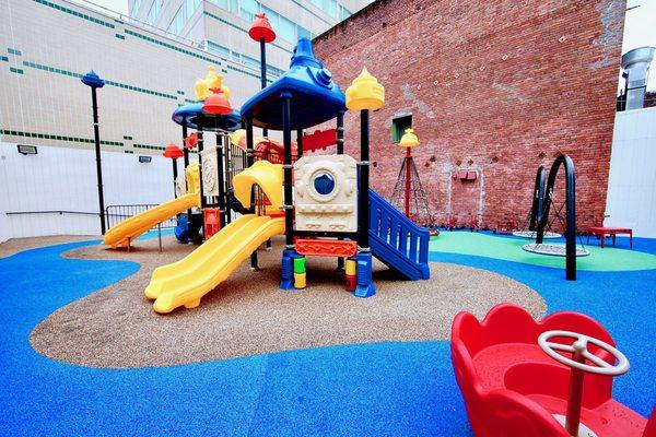 Private playground in the middle of hustle and bustle of the city... so happy and colorful WOW!