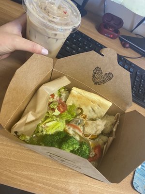 Smothered chicken grain box and iced caramel latte