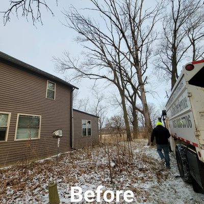 Customer requested that two trees be taken down to prevent damage if there was a bad storm.