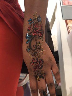 Airbrushed henna tat