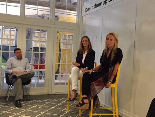 Rebecca Wofford and Deedee Mills present, Josh Jacobson moderates during an Illuminate session in Hygge's living room.