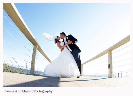 Bride and groom on dock in Lake county Ca on Clearlake