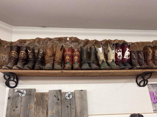 Just some of the owner's collection of cowboy boots!