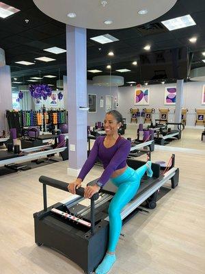 Julie B. enjoying the reformer experience at pilafes