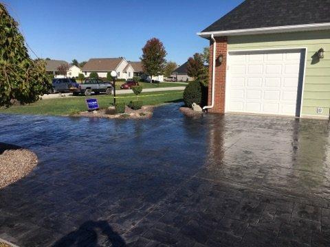 Elegant driveways with concrete or stamped concrete to make your day a bit smoother!