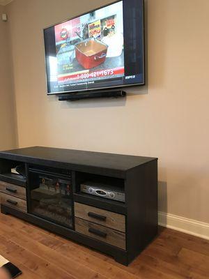 Installed 50 in. flat screen with stereo system. All cables and electrical concealed