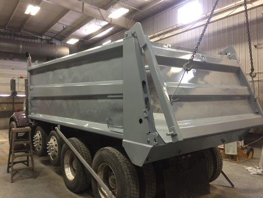 A dump truck repainted in our paint house