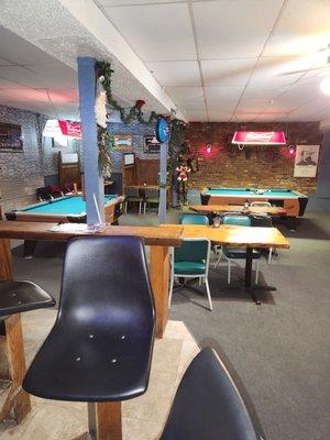 Two pool tables and a friendly environment.  Not a another dj/dance club or cabaret.  It's a 21st century dive bar for good folks.