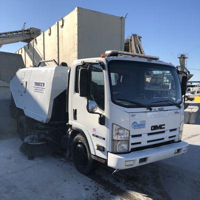 Construction sweeper at Los Angeles concrete plant.