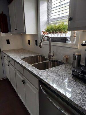 Kitchen counter top using granite called White Sparkle