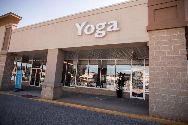 Evolution Power Yoga York studio in the Queensgate Towne Plaza on Springwood Road - right next to AT&T and the Wine and Spirits!