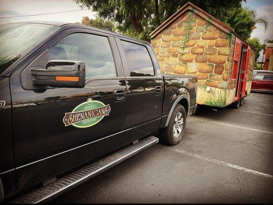 Truck pulling a trailered pub