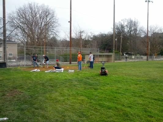 Getting the field ready for opening day in 2013