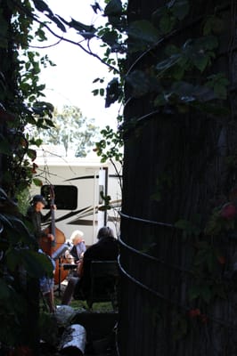 People jamming next to the silos.