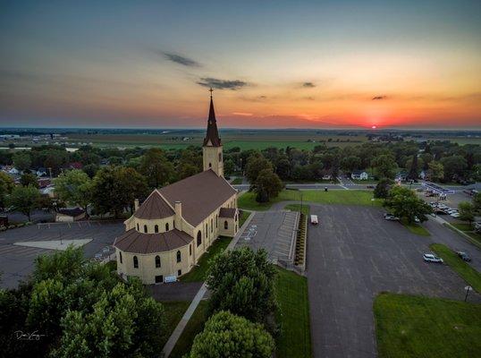 Steeple roofing can be a challenge. But taking pictures of the completed projects can be break taking.