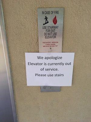 Elevator out of service sign that's been up for over 23 days