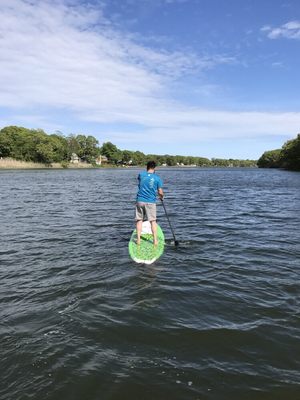 Happy dude on the rock solid. Great beginner board to enjoy the bay & some surf!