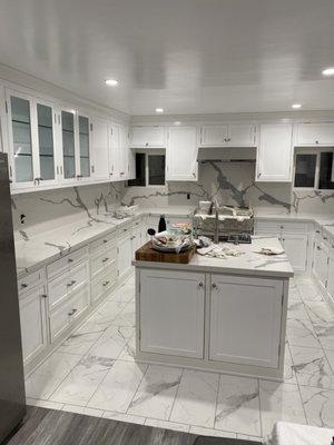 Custom Kitchen Cabinet Remodel With Inset Doors. Finished in Glossy White and Marble Stone