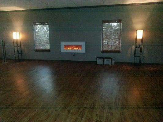 800 square foot yoga room with central fireplace