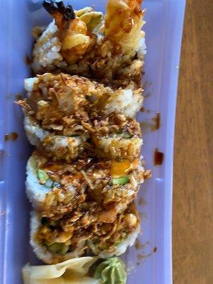 The Tempura Shrimp and Avocado meld well together inside, with a nice spicy sauce and friend, crunchy onions on the outside!!