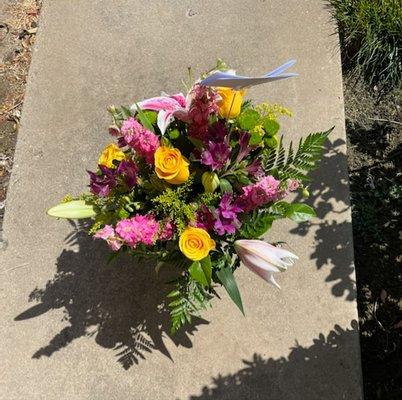 $50 custom arrangement.  All I said was, "my mom likes lilies"...ordered at 6pm, delivered next morning.