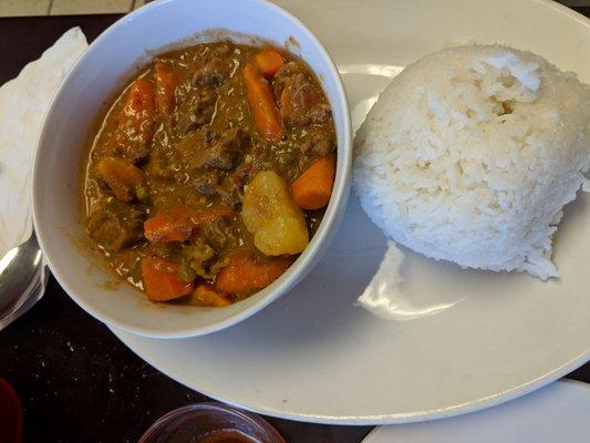 Caldereta. Similar to beef stew with carrots, bell peppers, potatoes, and a hefty serving of rice.