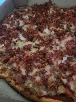 All meat pizza with extra  bacon