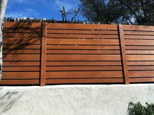 Modern Redwood Fence. Used as a privacy wall.