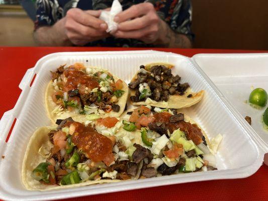 2 tacos asada and 2 tacos birria