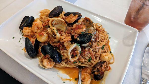 I've had the linguini pescatore before, clams, mussels, calamari, shrimp, and scallops in a slightly sweet tomato sauce. So so so good.