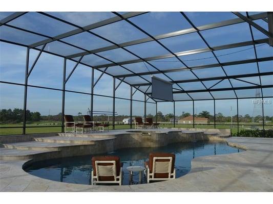 Quiet subdivision, electric gate with brick paver driveway which circles a 3 tier fountain..so much to this house..Energy eff...