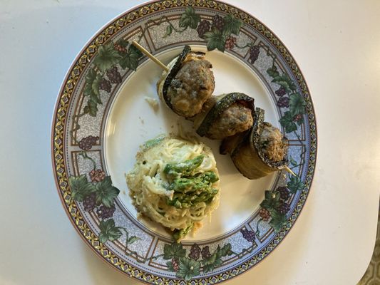 Your zucchini wrapped around veal meatballs with lemon, capers, parsley, and Parmigiano Reggiano, with your asparagus timbale.