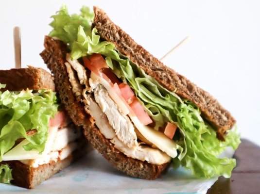 Whole wheat bread, chipotle dressing, chicken breast, lettuce, tomato and muenster cheese.