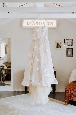 Beautiful wedding dress in our Cabin, one of two getting ready buildings for the wedding party.