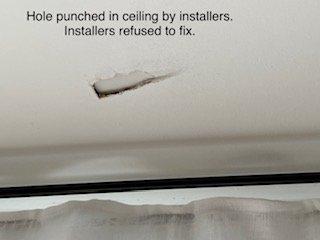 Installers Junior and Adeilson refused to repair the hole they made in ceiling.