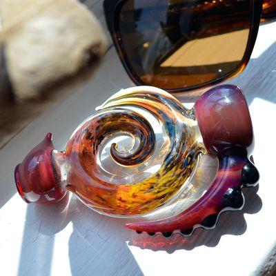 This frit horned chillum is available in our St. Cloud store. All pieces are hand selected for proper size and function.