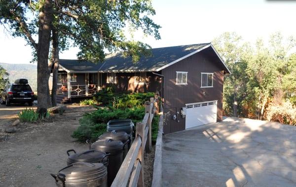 Front of the house on the left lower garage is game room and access to lower deck and living room.