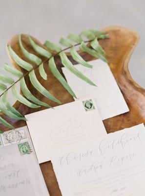 Invitation Suite on handmade paper with calligraphy and vellum accents.