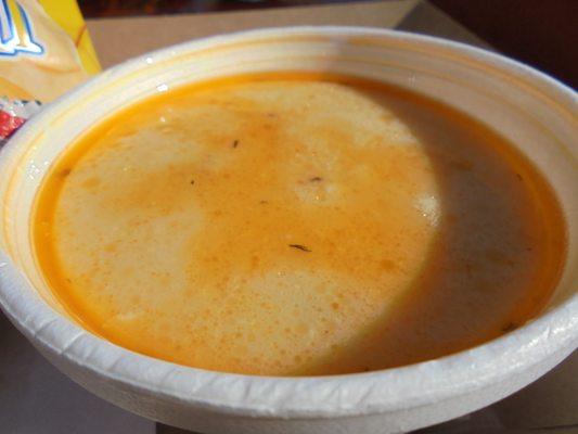 Beer cheese soup with veggies, close-up.