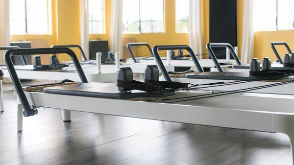 Daily Pilates reformer classes on Allegro 2 machines.