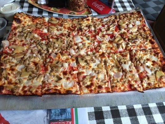 Large Pizza of beef, mushrooms and onions. Thin crust. Enough for two people!