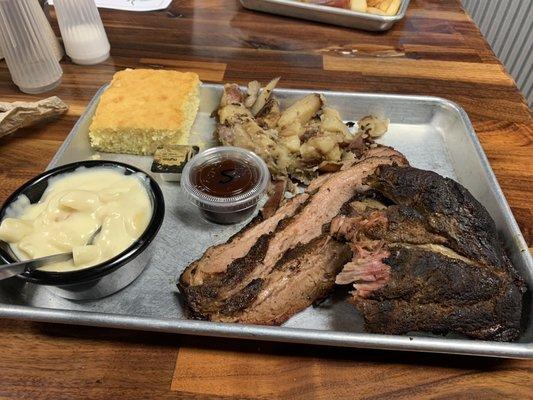 Brisket, ribs, Mac n cheese, corn bread, and some loaded potatoes. All delicious!