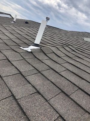 Fixed missing shingles and cleaned up my Gutters.