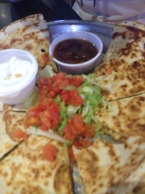 Good quesadillas, great bar to watch sports. Smoking allowed.